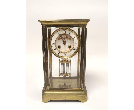 Late 19th century French gilt brass four glass mantel clock, the twin train enamel dial with skeleton movement and mercury di