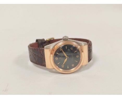 Rolex Oyster perpetual gent's watch with black dial, sweep seconds in unusual stainless steel case with gold bezel and should