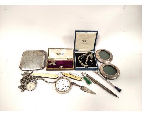 Graves 'Express' lever watch on silver guard, another, a silver cigarette case and various other items. This item contains iv