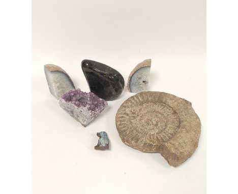 Group of geode and natural specimen rocks to include an amethyst geode converted to candle holder, South Seas style polished 