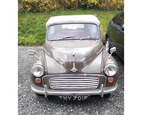 Motor car. Chocolate and cream soft top 1968 Morris Tourer series II model convertible Morris 1000 in standard form with red 