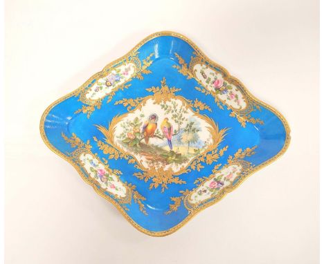 19th century Sevres marquise shaped serving dish, decorated to the well with hand painted panel of birds in foliage on opaque