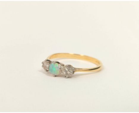 Diamond and opal three stone ring, 2.1g. '18ct platinum 1930's, size 'R'.