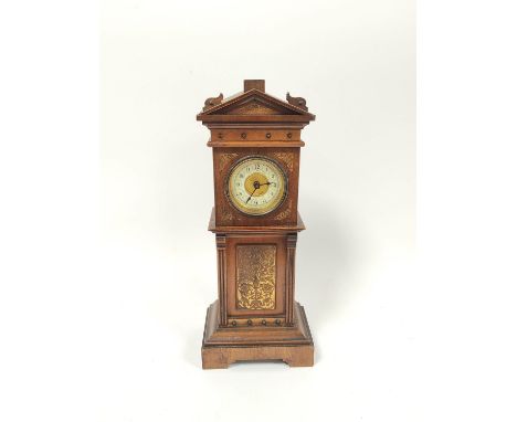 Miniature apprentice mahogany table clock in the form of a longcase clock circa late 19th / early 20th century, old label to 