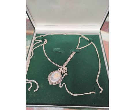 Silver pendant with portrait of Elizabethan style on 19th century close curb necklet.
