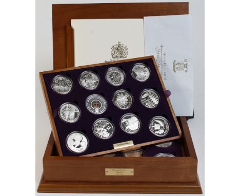 Queen Elizabeth II Golden Jubilee Collection, the 24 coin set of Silver Crown sized coins from around the world 2002-2003 som