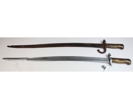 Bayonets: French Model 1866 Sabre bayonets for the Chasspott Rifle. One St Etienne April 1870, second: Chateller- ault Febre 