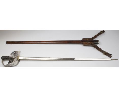 British Officers GVI dress sword with leather scabbard and frog. Blade maker marked 'Henry Wilkinson Pall Mall London', and n