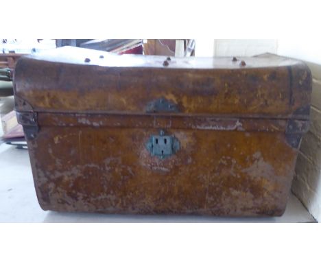 A late Victorian Perry Son &amp; Co of Wolverhampton, brown enamel painted tin trunk with a hinged lid&nbsp; 17"h&nbsp; 27"w&