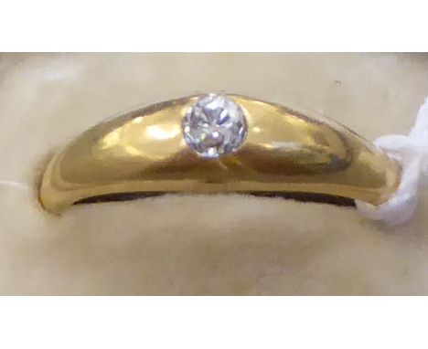 An 18ct gold single stone, rubover set diamond ring&nbsp; 