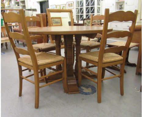 A modern 19thC style bespoke, light oak, tip-top breakfast table of planked and dowelled construction, raised on four, equidi