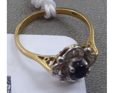 An 18ct gold diamond and sapphire cluster ring&nbsp; 