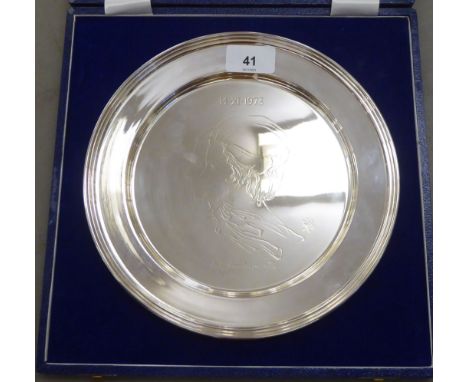An Annigoni silver plate (no.1120) scratch engraved with a head and shoulders profile portrait of the Princess Anne and Capt.