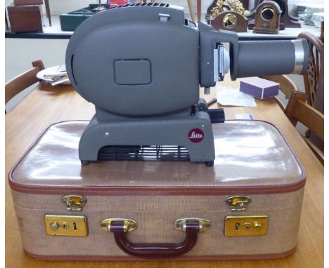 A Leitz Prado projector, model no.170435&nbsp; 9"h in a contemporary case 