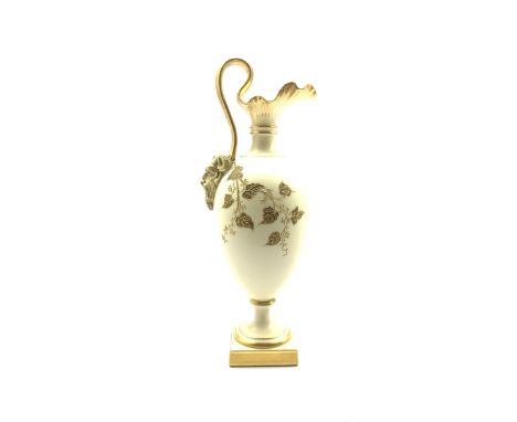 Royal Worcester blush ivory ewer the base of the handle decorated with a satyr mask and decorated with floral sprays, raised 