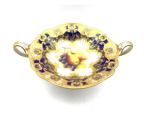 Royal Worcester porcelain twin-handled comport painted by Albert Shuck, signed, with grapes and pears, the border with six sh