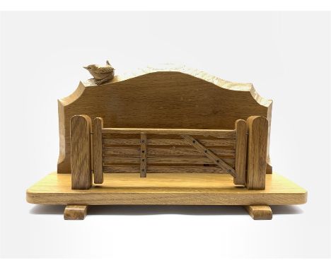 Bob Hunter of Thirlby 'Wrenman' oak letter rack modelled as a five bar gate, the shaped backboard with adzed edge and carved 
