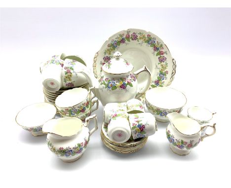 Coalport 'Maytime' pattern tea set comprising six cups and saucers, six plates, milk jug, sugar bowl and cake plate and a mat