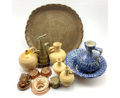 Moroccan earthenware blue and white ewer and basin, four terracotta jars, North African brass coffee pot and cups, brass tray