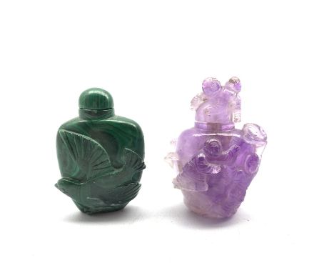 Chinese amethyst snuff bottle, carved in high relief with children playing, H7cm together with a Malachite carved snuff bottl