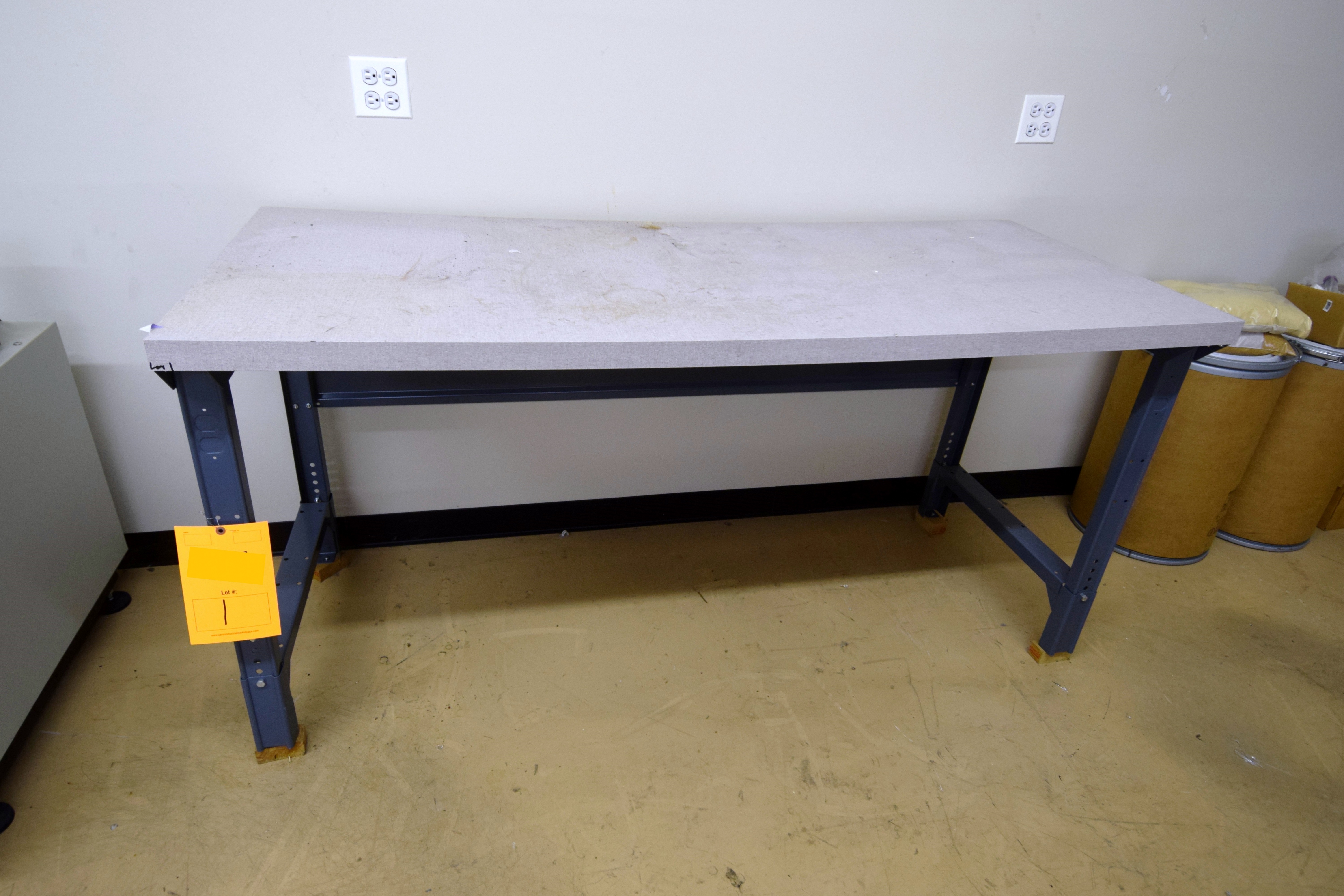 Formica top work table, approximate 72" long x 30" deep. With metal legs.