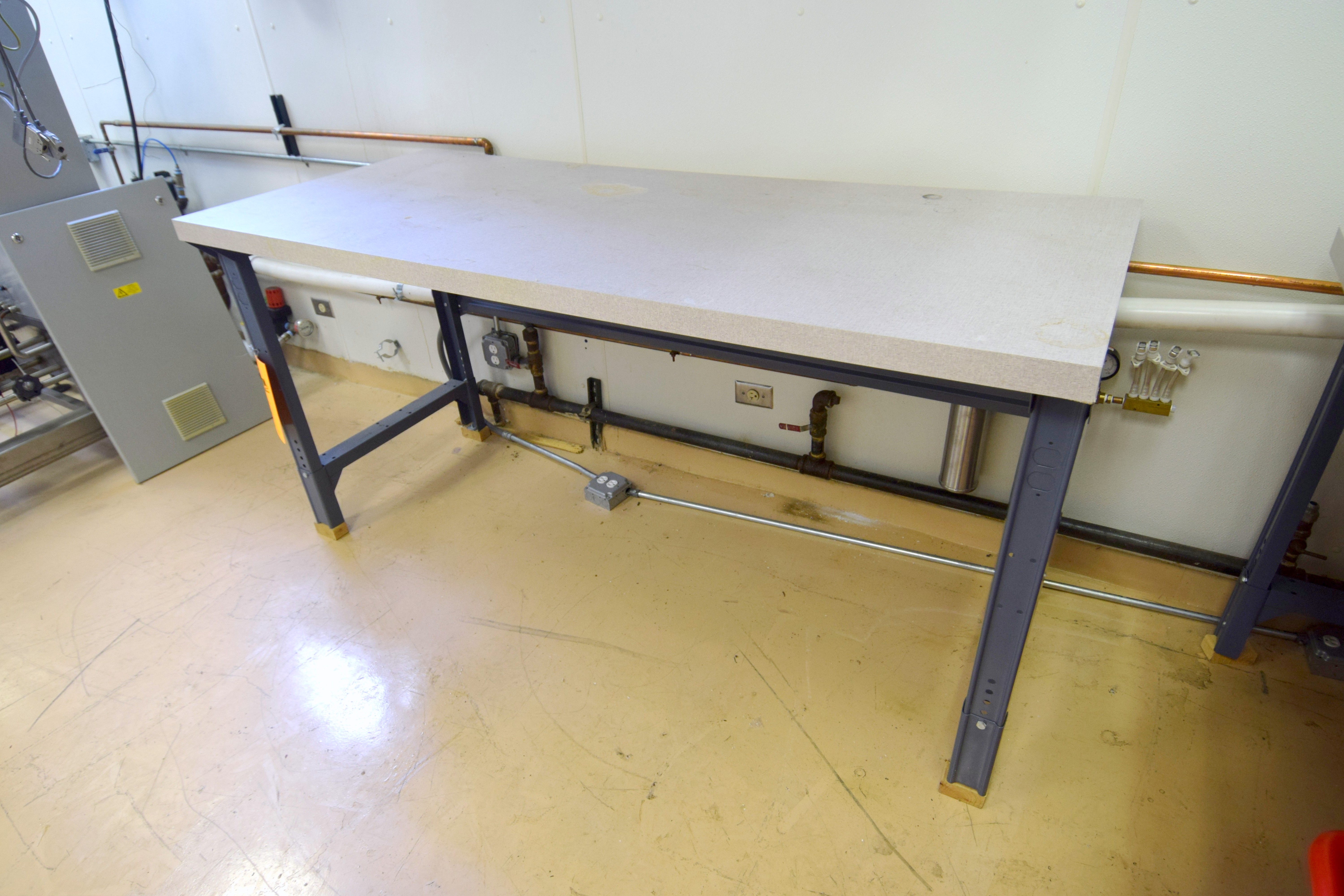 Formica top work table, approximate 72" long x 30" deep. With metal legs.