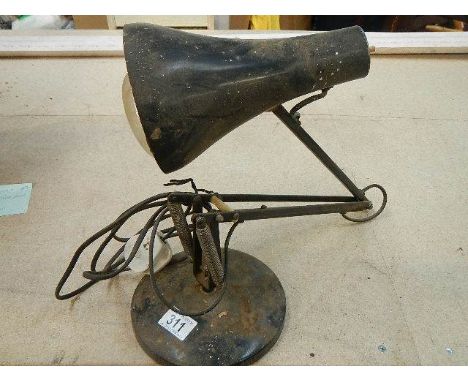 A mid 20th century angle poise lamp.