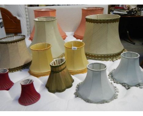 A mixed lot of mid 20th century lamp shades in various sizes, 12 in total.