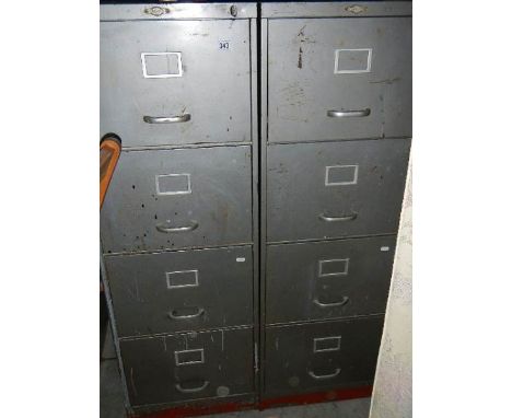 2 metal filing cabinets (one missing  lock and key) containing tools.
