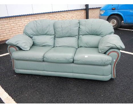 A green leather sofa in good condition. (chair has been withdrawn)