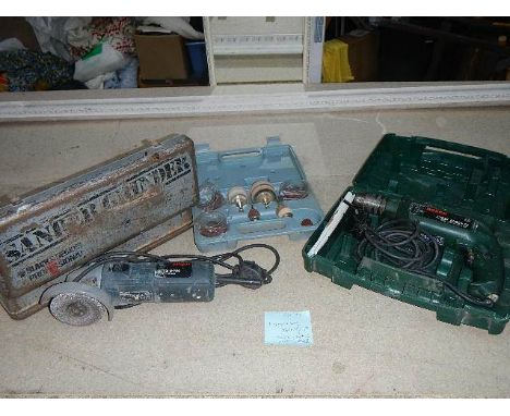 A Bosch impact drill and a 4" grinder, both working.