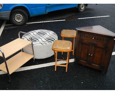 A corner cupboard, 2 foldable stools, pouffe etc.,