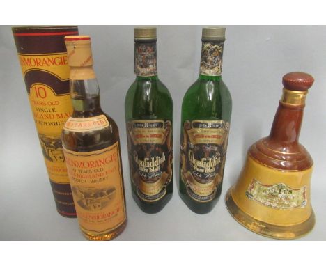Four bottles of scotch whisky, comprising 1 10yr old Glenmorangie, 2 "over 8 years" Glenfiddich and 1 Bell's decanterConditio