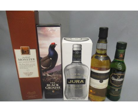 Five bottles and one half bottle scotch whisky, comprising 1 boxed Jura 10yr old, 1 boxed The Peat Monster, 1 12yr old Lochru