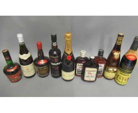 10 mixed bottles of alcohol, comprising 1 bottle Moet & Chandon Imperial Brut champagne, 1 Captain Morgan rum, 3 hip flask bo