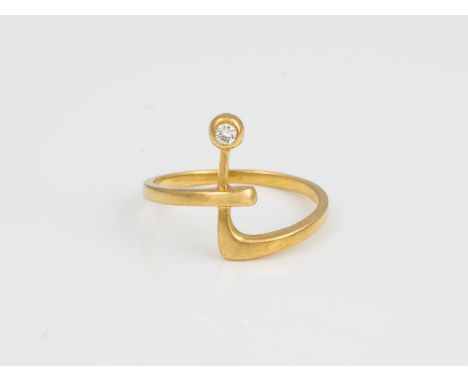 BRILLANT RING GG 750. Ringmaß ca. 53. Ges.-Gew.: ca. 2,3 g. Ein Brillant, ca. 0.04 ct. Herstellersignet CB.