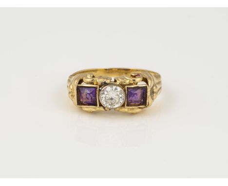 AMETHYST RING GG, WG 585. Ringmaß 55. Ges.-Gew.: 2,86 g. Zwei Amethysten im Carée Schliff, zusammen ca. 0.65 ct; ein Brillant