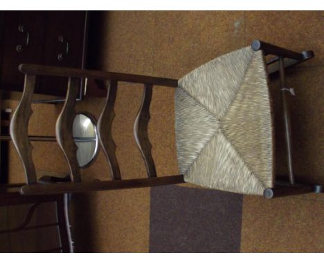 Rush seated ladder back rocking chair 