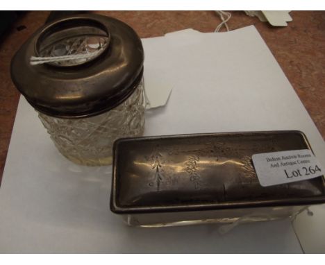 Silver topped hair tidy together with silver topped trinket box 