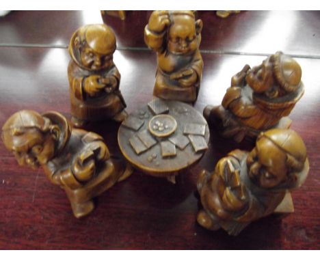 Set of monk figures playing cards