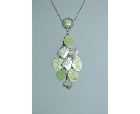 A white metal enamel pendant necklace with drop pendant in the Art Nouveau style. Monogram tag Ikita for Ikita Paris. Measure