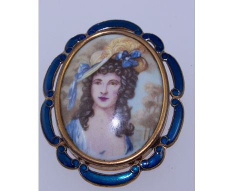A 1950s Thomas L Mott yellow metal brooch with over painted portrait with enamel decorated frame and roller clasp. Marked ver