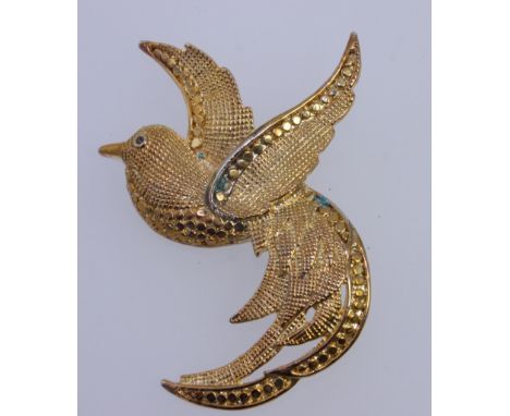 A good quality large  vintage yellow metal brooch in the form of a bird of paradise . Roller clasp. Measures 7cms. Weight 25.