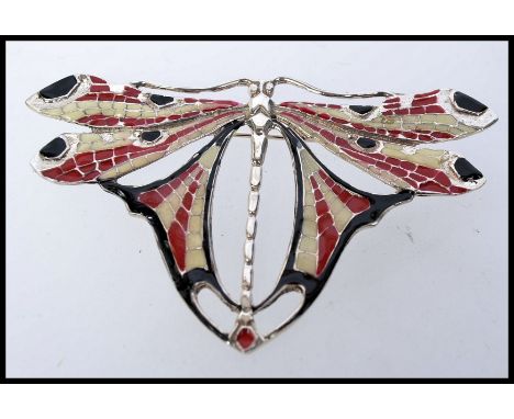 A large  925 silver and enamel Art Nouveau style brooch in the form of a dragonfly. Measures 8cms x 5cms.