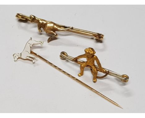 18KT ENAMEL DOG STICK PIN 1.6G TOGETHER WITH 9CT GOLD KANGAROO BROOCH 5.4G AND SILVER GILT MONKEY BROOCH 2.9G