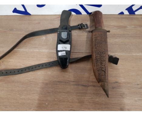 A SCUBA DAGGER NO 107954 AND ANOTHER WITH CARVED WOODEN GRIP AND SHEATH