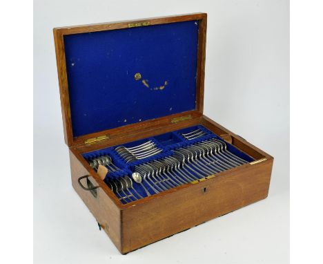 Oak cased part canteen of old English pattern cutlery by Josiah Williams & Co  comprising 12 table forks, 11 desert forks, 12