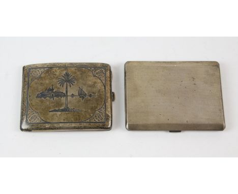 Engine turned silver cigarette case Birmingham 1956 4.8oz 151gm and a white metal cigarette case, decorated with Nile Scene, 