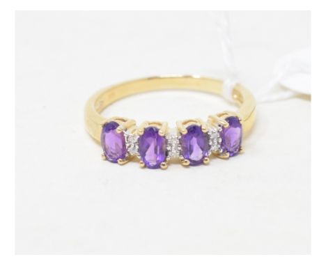 A 9ct gold, amethyst and diamond eternity ring 