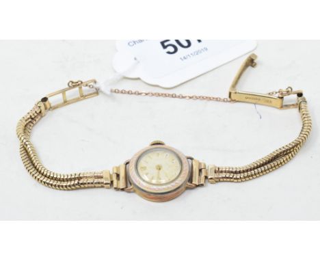 A lady's 9ct gold and enamel wristwatch, with baton indicesApprox. 17.2 g (all in) 